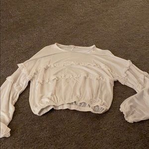 Don’t ask why American Eagle white ruffle sleeved